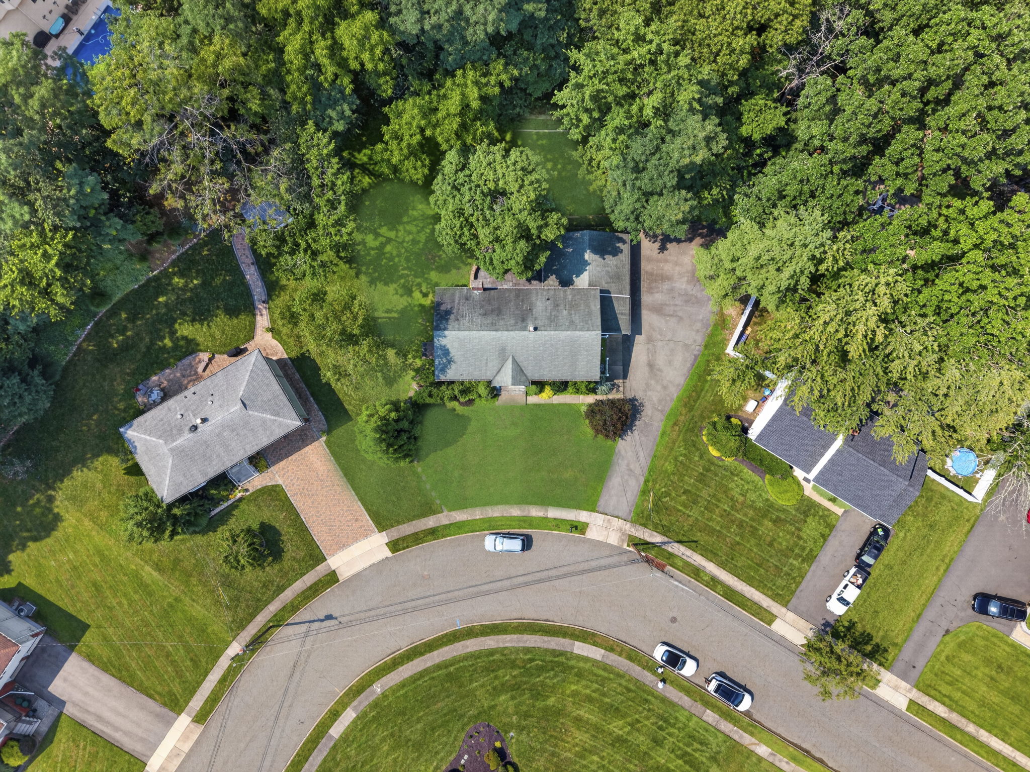Set on a larger-than-typical property of nearly 3/4 acre, this 5-bedroom, 4-bath bi-level offers 2,796 sq ft of living space. Great curb appeal, a large driveway, and a side-entry garage create a memorable first impression as you arrive along the sidewalk-lined, tree-lined street.