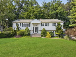 Set on a larger-than-typical property of nearly 3/4 acre, this 5-bedroom, 4-bath bi-level offers 2,796 sq ft of living space. Great curb appeal, a large driveway, and a side-entry garage create a memorable first impression as you arrive along the sidewalk-lined, tree-lined street.