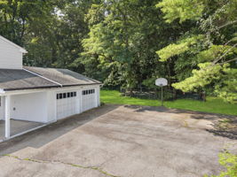 Set on a larger-than-typical property of nearly 3/4 acre, this 5-bedroom, 4-bath bi-level offers 2,796 sq ft of living space. Great curb appeal, a large driveway, and a side-entry garage create a memorable first impression as you arrive along the sidewalk-lined, tree-lined street.