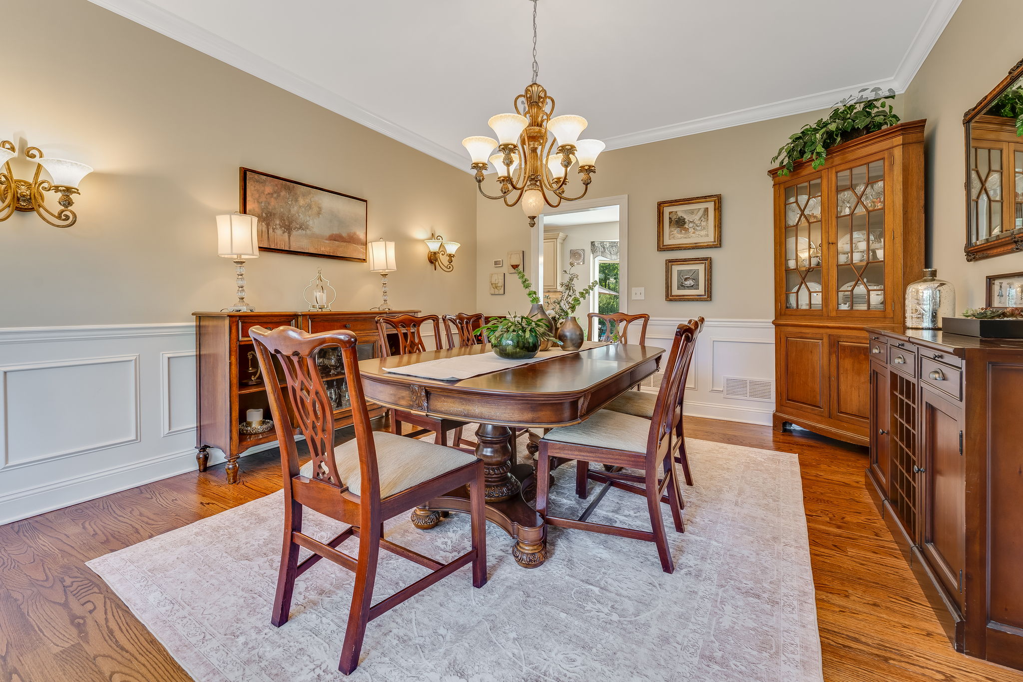 FORMAL DINING ROOM Crown and Chair Rail Moulding, Box Trim, Bronze and Frosted Glass Light Fixture, Sconces, Bay Window, Hardwood Flooring