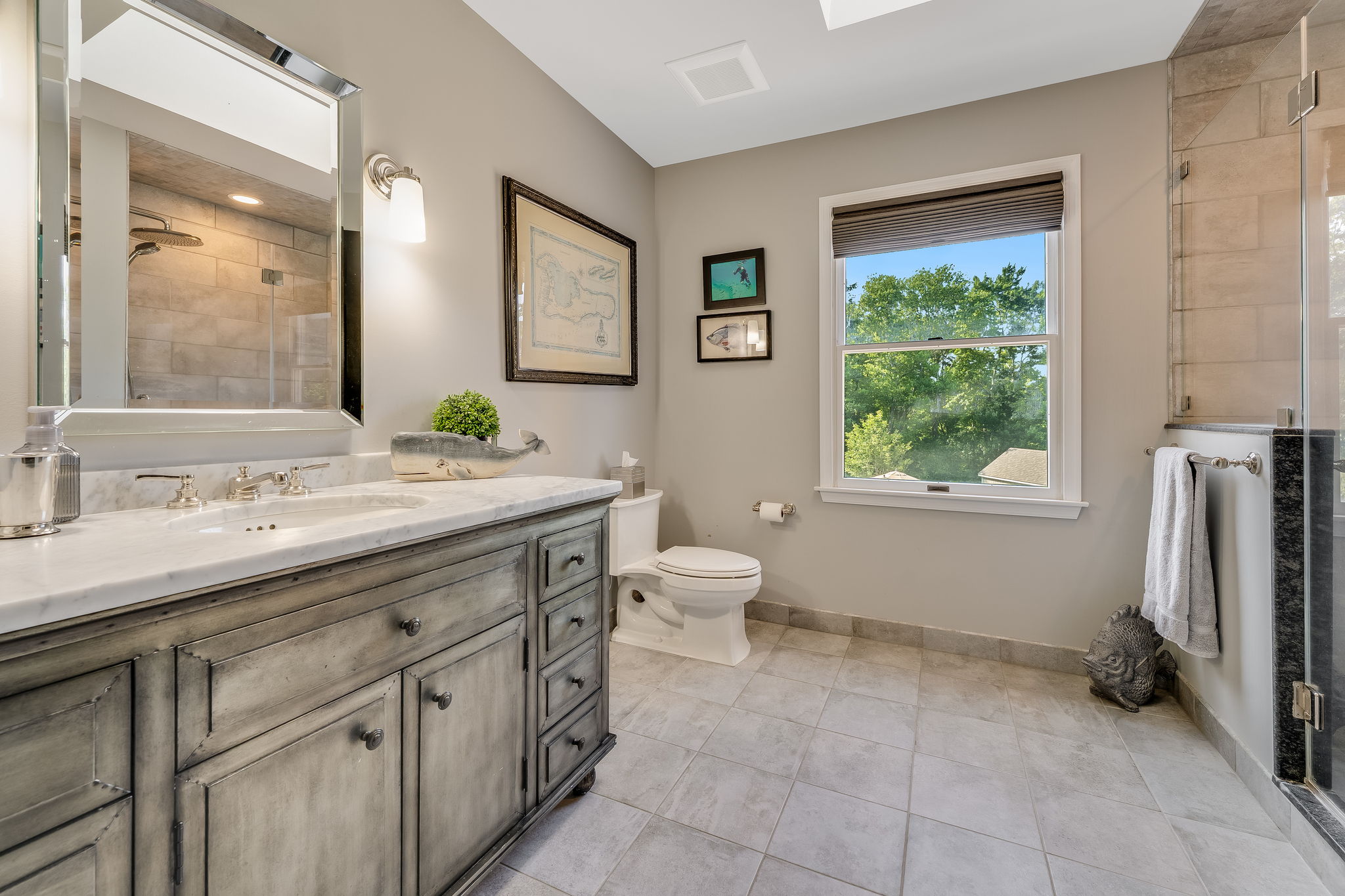 HALL BATH Remodeled 2016 - Skylight, Furniture Grade Vanity with Marble Top and Undermount Porcelain Sink, Programmable Heated Tile Floor