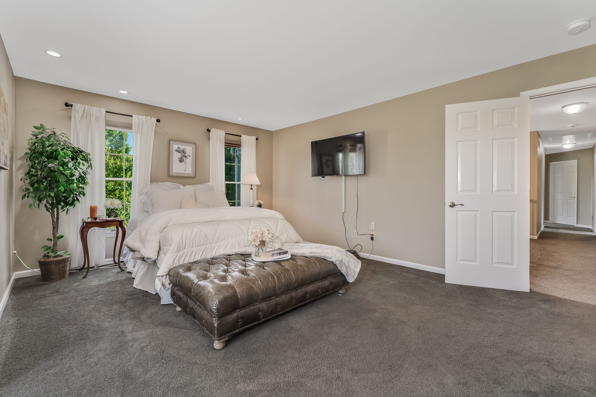 PRIMARY BEDROOM Lighting, Walk-in Closet. Wall-to-Wall Carpeting