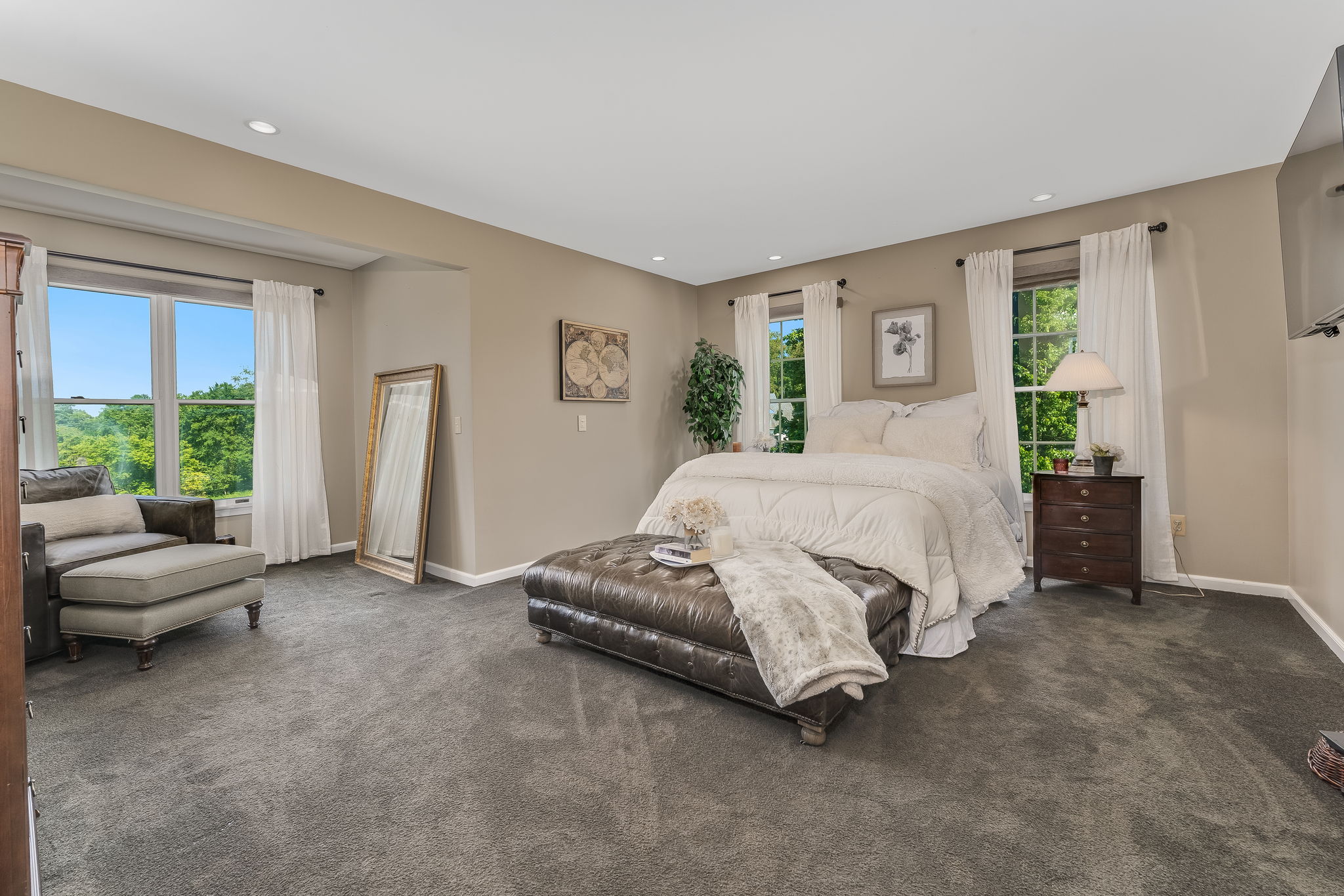 PRIMARY BEDROOM Lighting, Walk-in Closet. Wall-to-Wall Carpeting