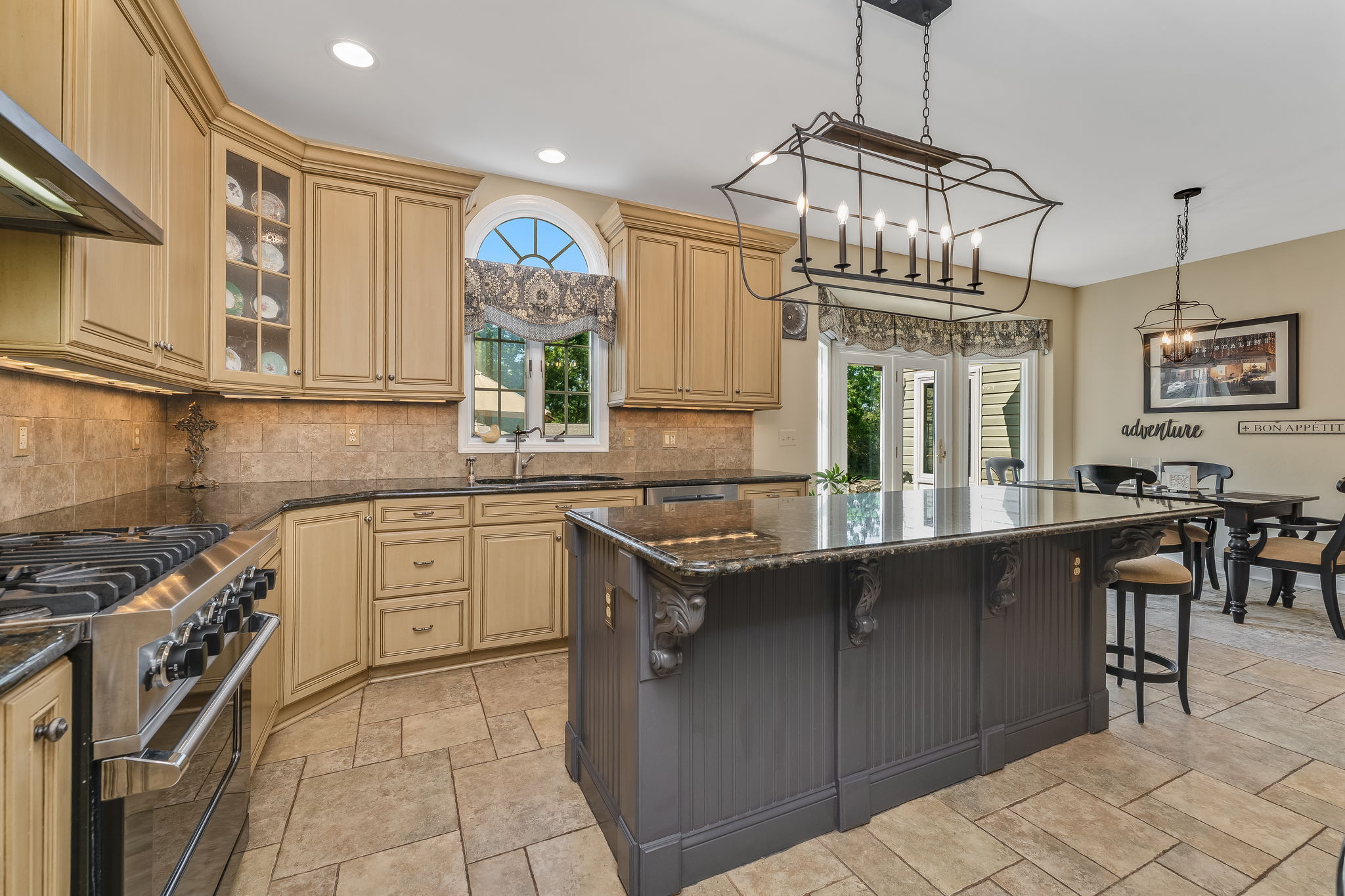 GOURMET KITCHEN Raised Panel Cabinetry, 42 inch Upper Cab, Desk, Wine Cubbies, Spice Racks, Recessed Lighting, Cage Light Fixtures, Under Cab Lighting, Above Cab Lighting