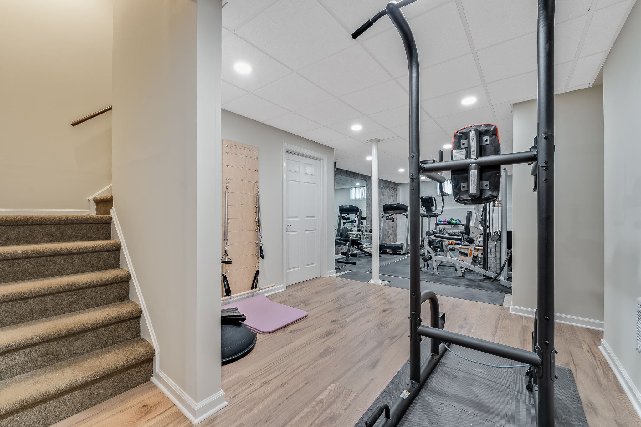 FINISHED LOWER LEVEL Dedicated fitness room.