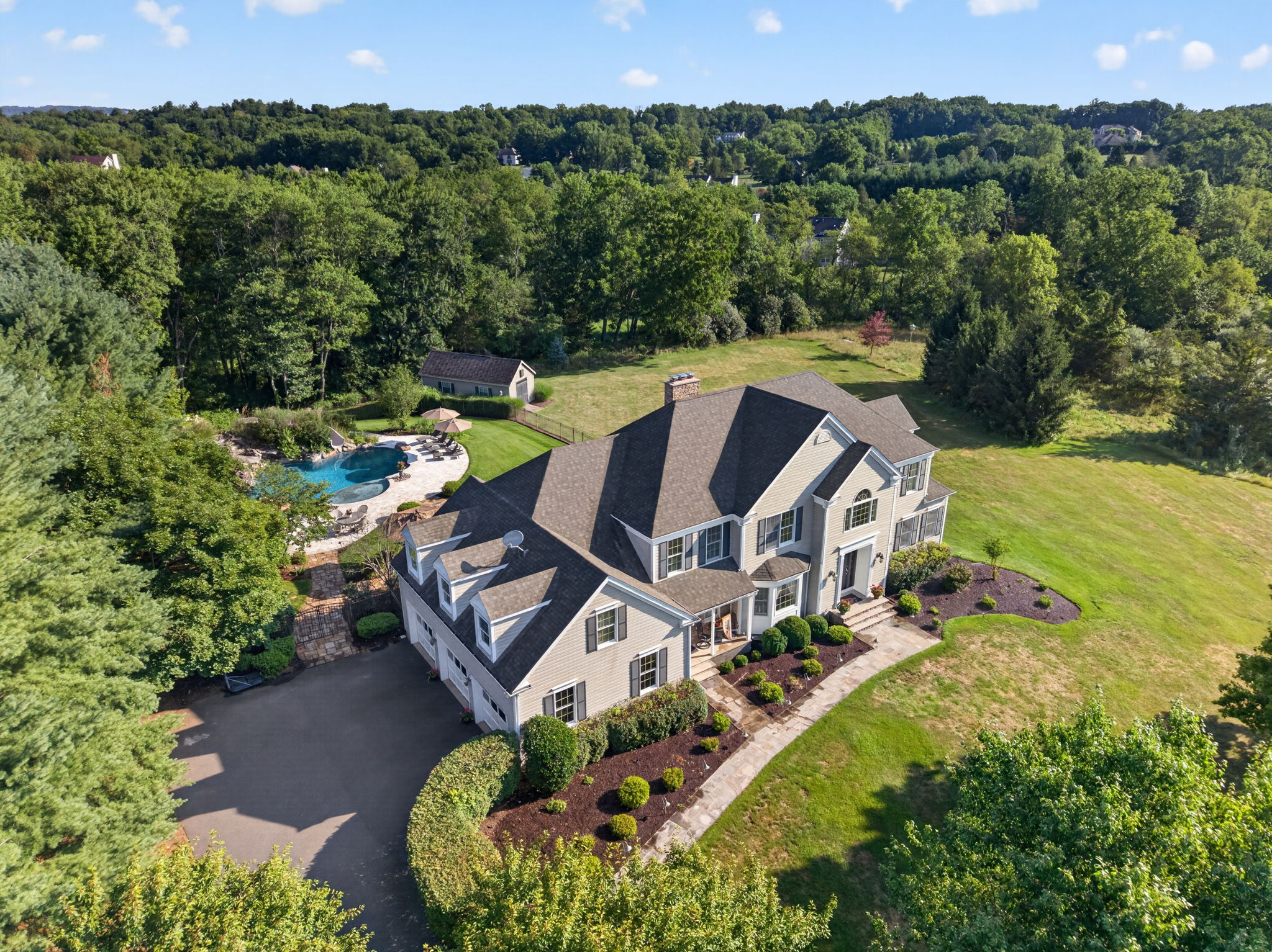 FRONT ELEVATION Welcome to a home where luxury and exceptional design come together. 4,223 Sq Ft of beautifully appointed living space plus a finished walk-out lower level.