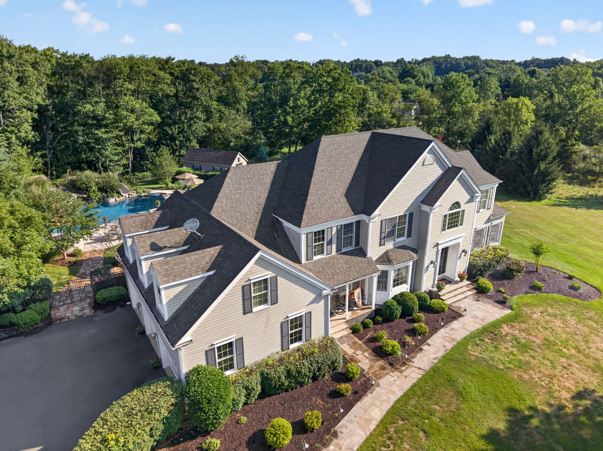 FRONT ELEVATION Welcome to a home where luxury and exceptional design come together. 4,223 Sq Ft of beautifully appointed living space plus a finished walk-out lower level.