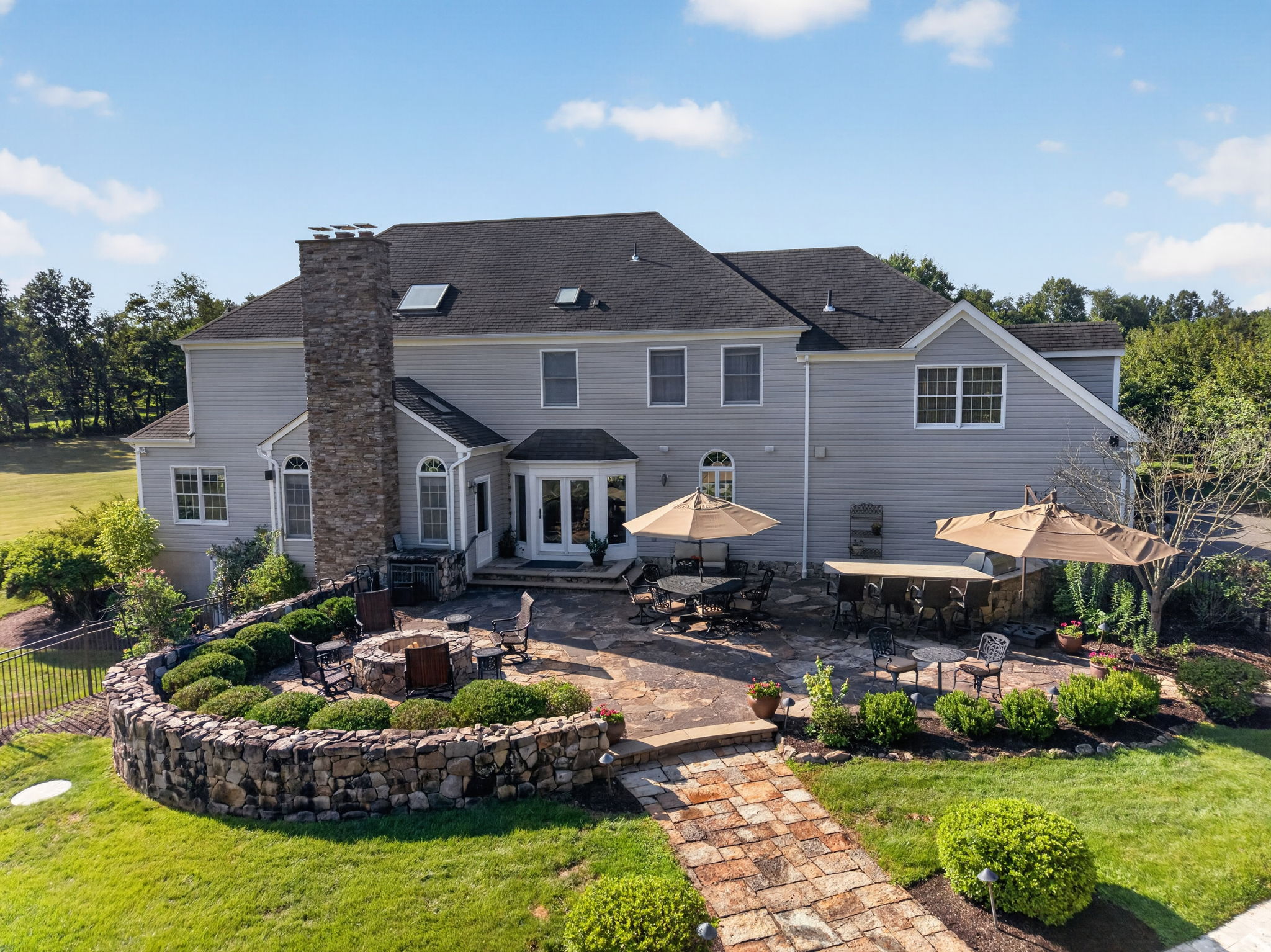 BACKYARD/PATIO Outdoor living, recognized with a feature in Design New Jersey magazine, is equally impressive.
