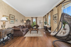 FORMAL LIVING ROOM Crown Moulding, Hardwood Flooring