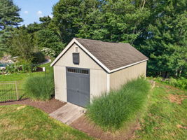 NE ENGLAND STYLE SHED Amish-built Shed - Onsite Construction by Amish Craftsmen, Classic New England Style. Features Include: Loft, 30 x 36, 2 Windows, Transom Window, 5 x 5 Ramp