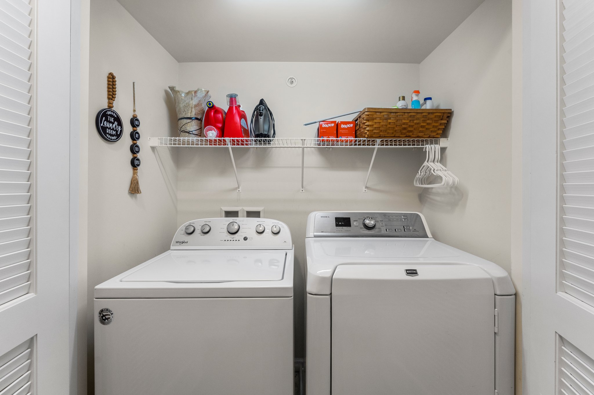 Laundry closet with shelving