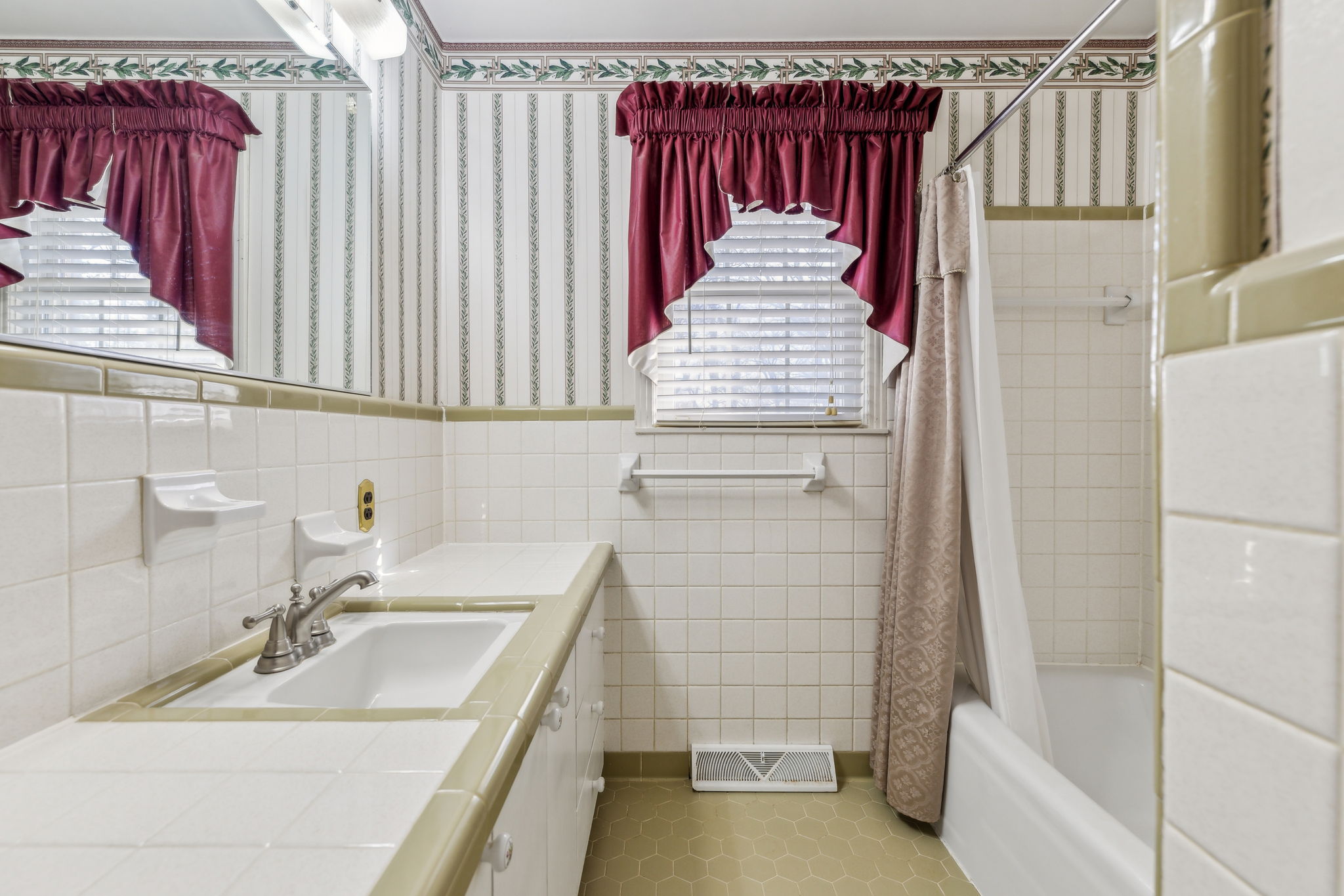 Guest bath located across from 2nd & 3rd bedrooms