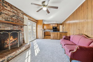 Cozy den with brand new carpet, perfect for watching tv with friends and family