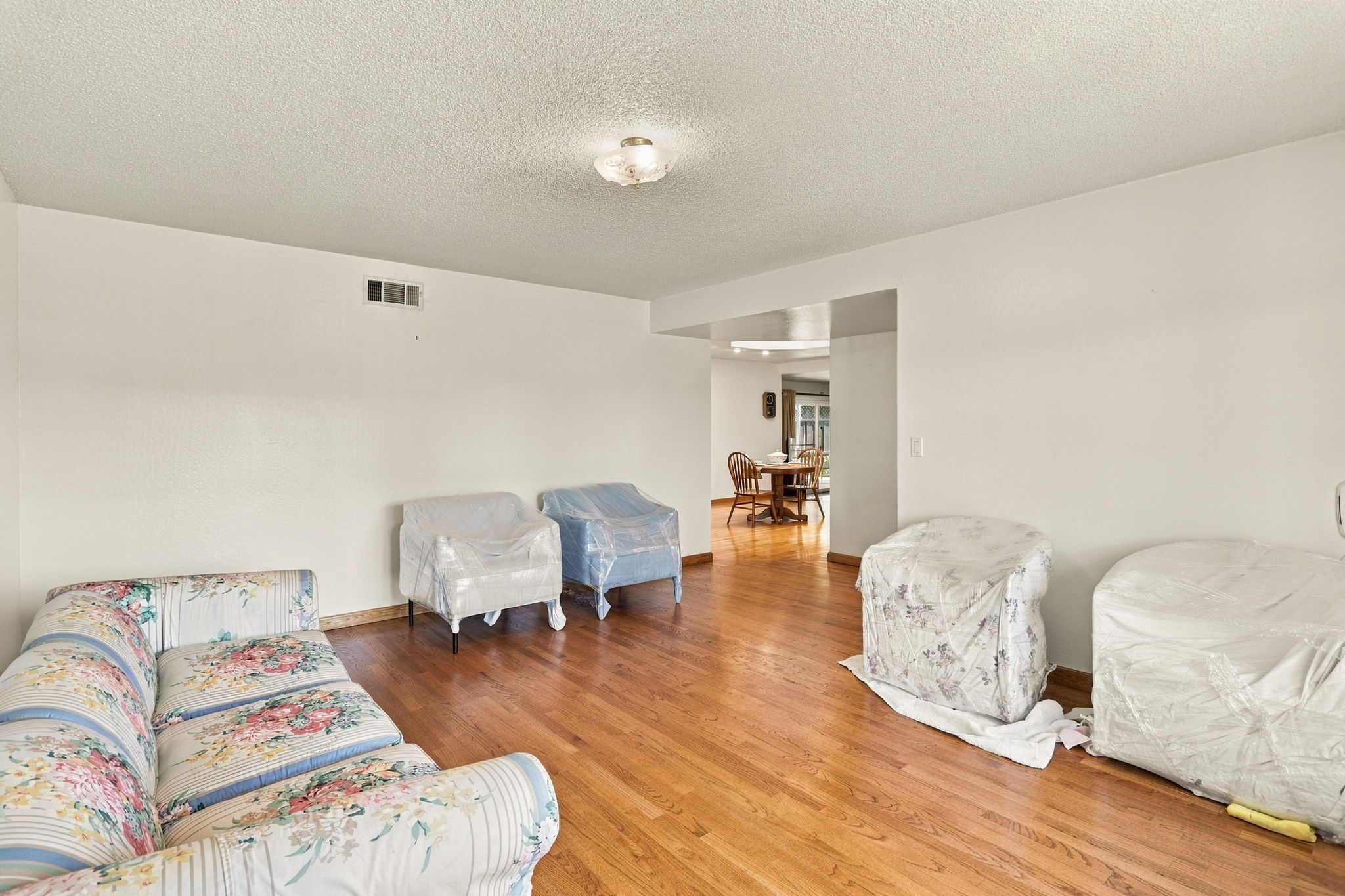 Homes in this Housing Tract have easily converted the Living Room to a 5th BR!