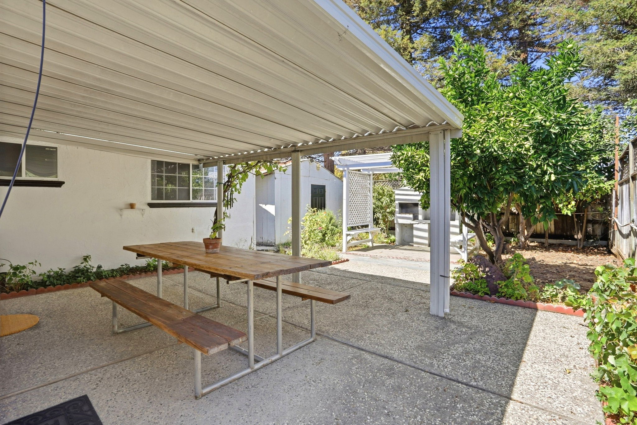 View of 518 sf. Shed Entrance from the Backyard Patio