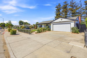 2 Car Garage w/Auto Opener + Space to Park 3 Cars inside the Fenced & Gated Perimeter