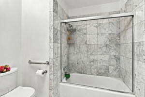 Hall Bath Custom Natural Carrera Marble Walls Embracing the Shower o/Tub
