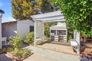 Custom European Style Wood Fired Pizza Oven near the Backyard Entrance to the HUGE 14'x37' Storage Shed