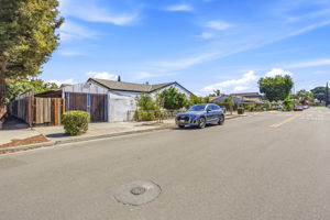 Huge 518 sf. Shed o/Concrete Pad built in 1973 is accessible from both the Backyard & Aetna Way