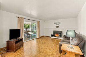 Step-down Family Rm with Wall to Wall Brick Fireplace Mantle o/Oak Parquet Floor opening out Alfresco to Covered Patio!e