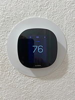 Digital Thermostat in Hallway