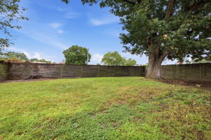 spacious, fully fenced back yard