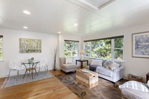 A canopy of green surrounds the room—frequent visits from eagles, hawks, and falcons only add to the treehouse feel.