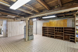 This unfinished area is equipped with custom cabinetry and open shelving—ideal for sorting tools, storing supplies, or staging your next home improvement project. A flexible space with serious function. 🔧 Bonus: A built-in workshop exhaust system is already in place. 📋 Home and sewer inspections (Sept. 2025) available upon request.
