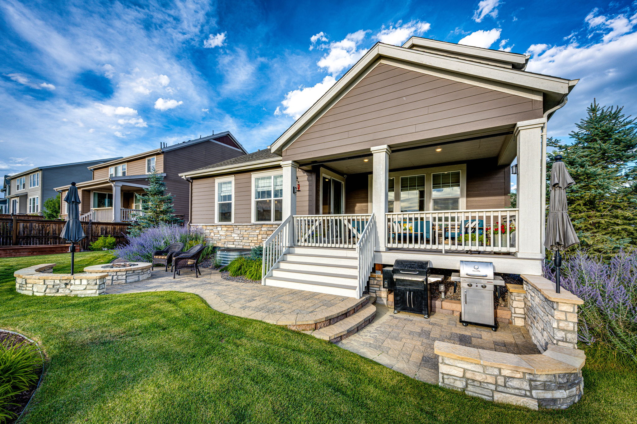 Covered back deck, gas firepit, & BBQ area