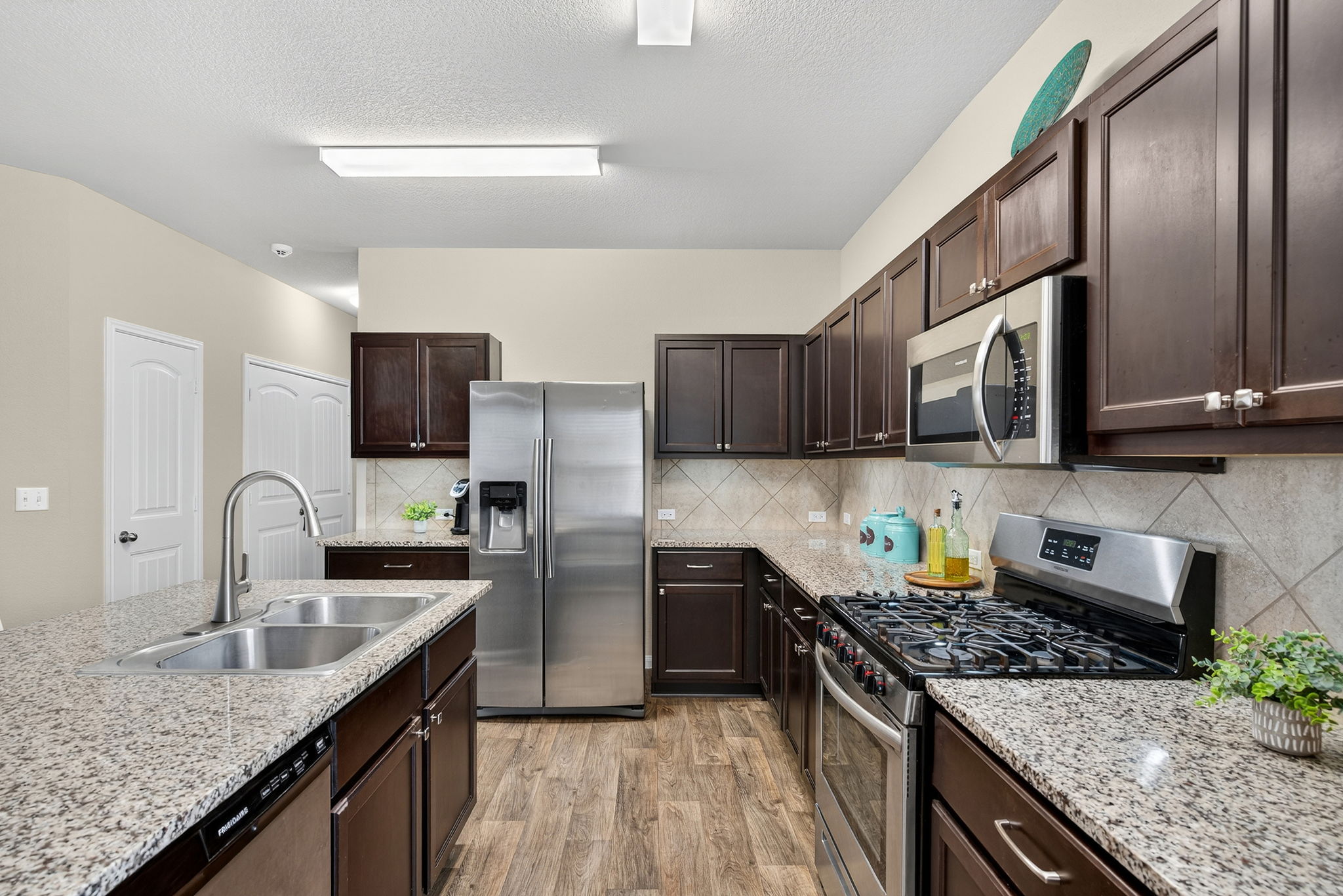 Recently updated kitchen faucet and under cabinet lighting.