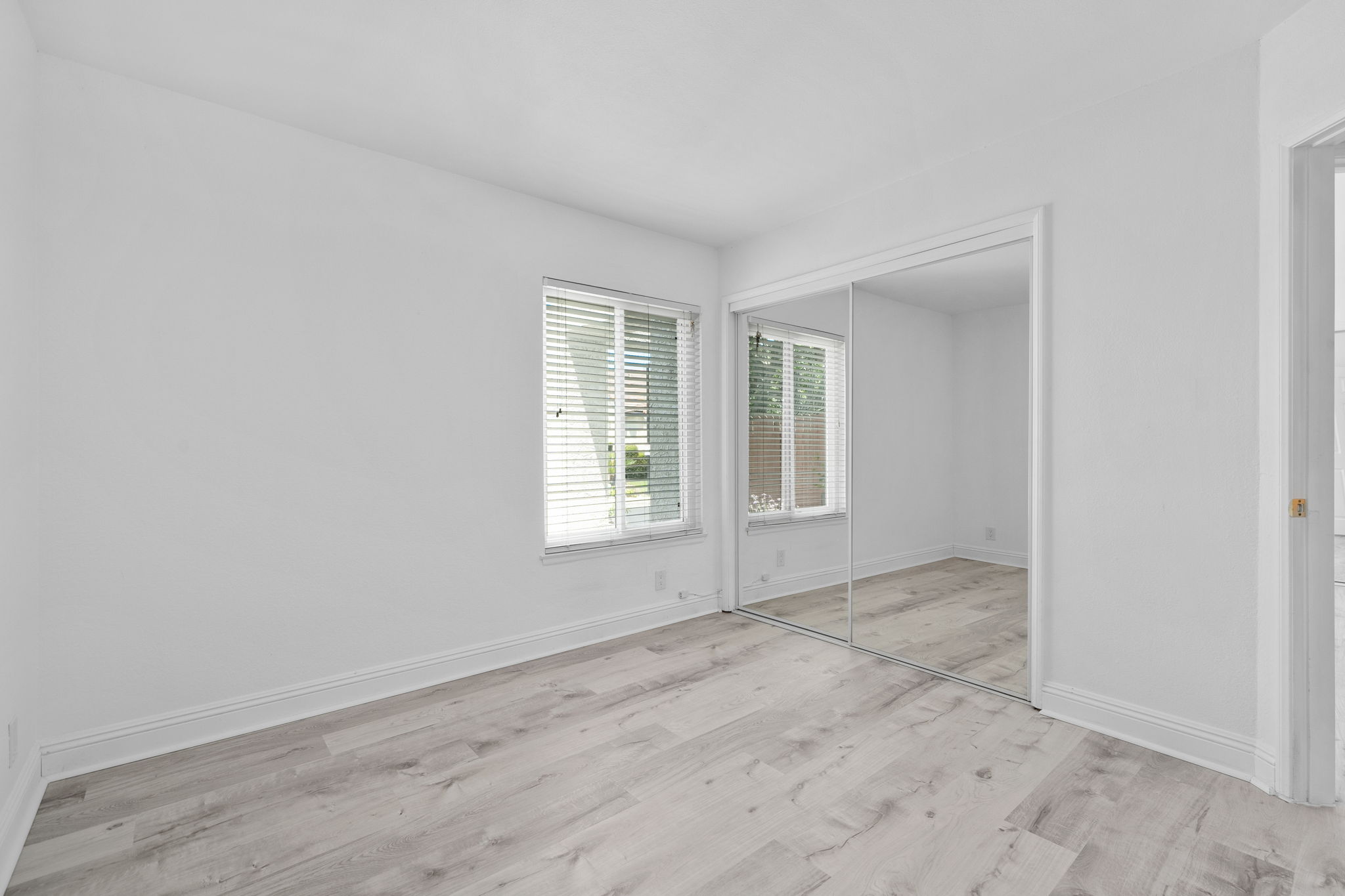 2nd Bedroom/Office with Mirrored Closet Doors