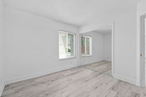 2nd Bedroom/Office with Mirrored Closet Doors