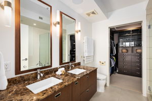 Primary suite bathroom and walk in closet