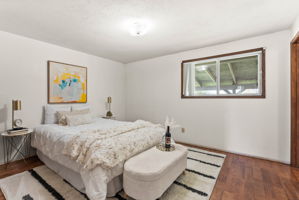 Primary Bedroom. Here it sits on the main floor, and has its own full bathroom.