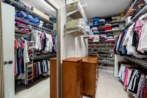 Two walk-in primary closets