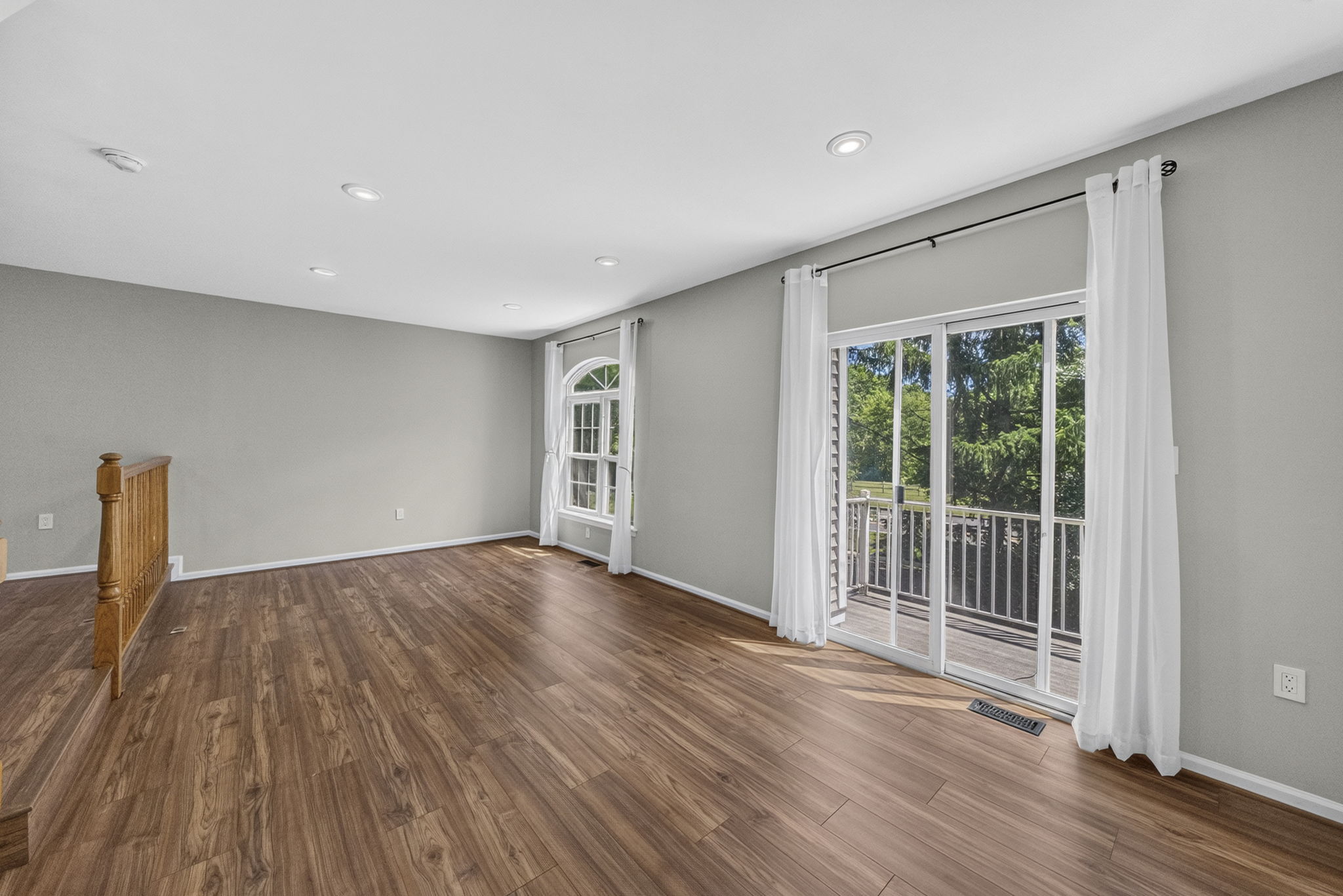 2nd floor Living Room with Sliding Door to Balcony