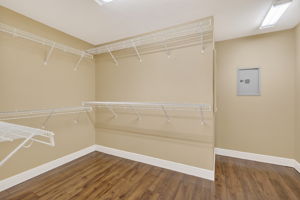 Primary Bedroom Walk-In Closet with Built-In Safe