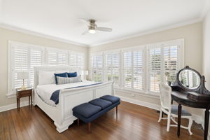 Bedroom with wood blinds