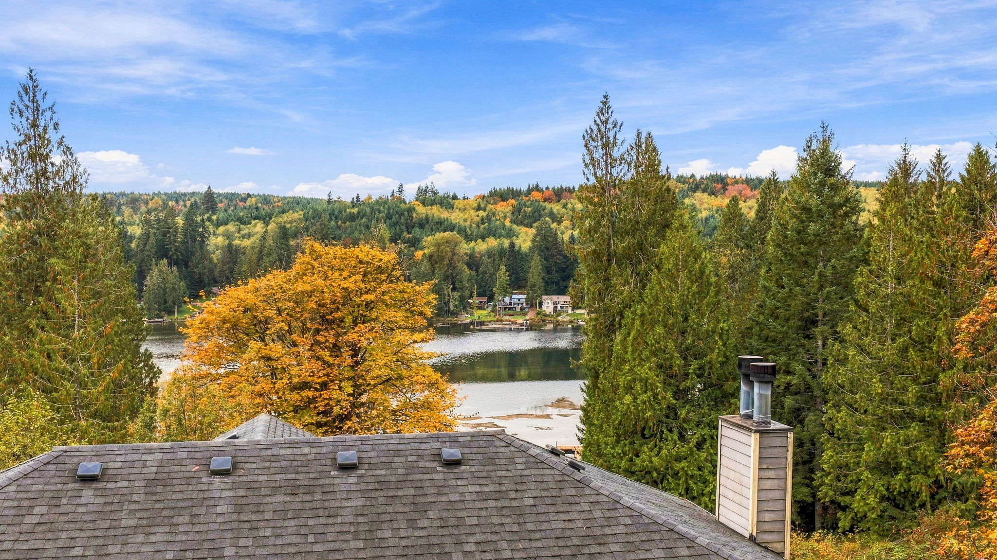 Roof of home and view of Lake Roesiger