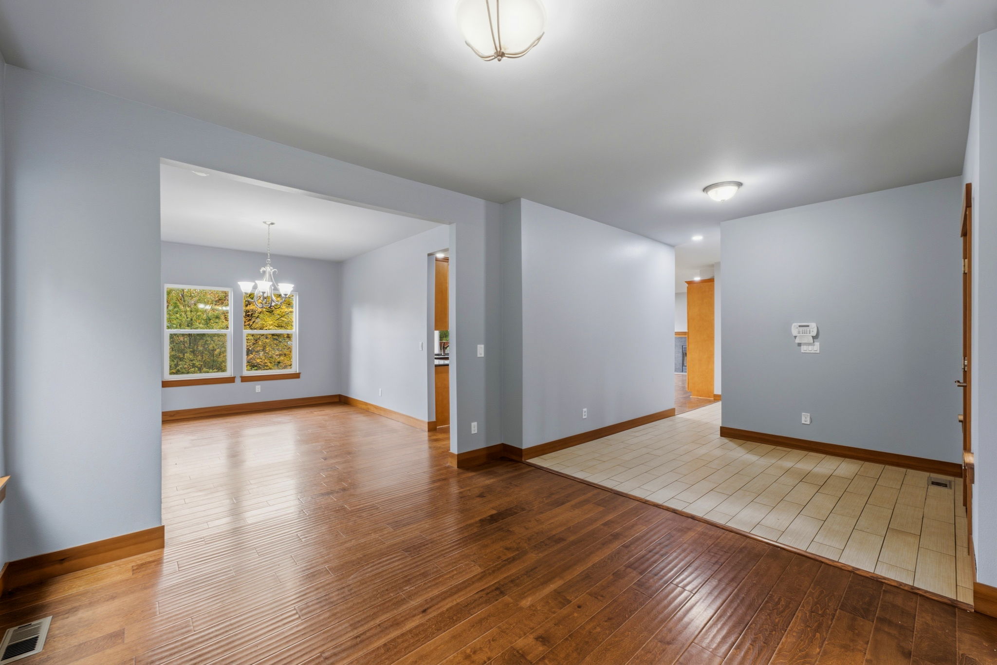 Living Room looking at dining to the left and entryway to the right
