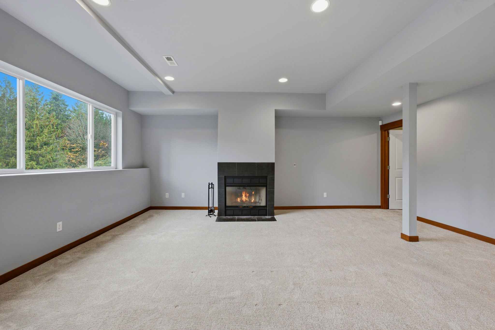 2nd Living room, downstairs; large walk in closet to the right, water views to the left
