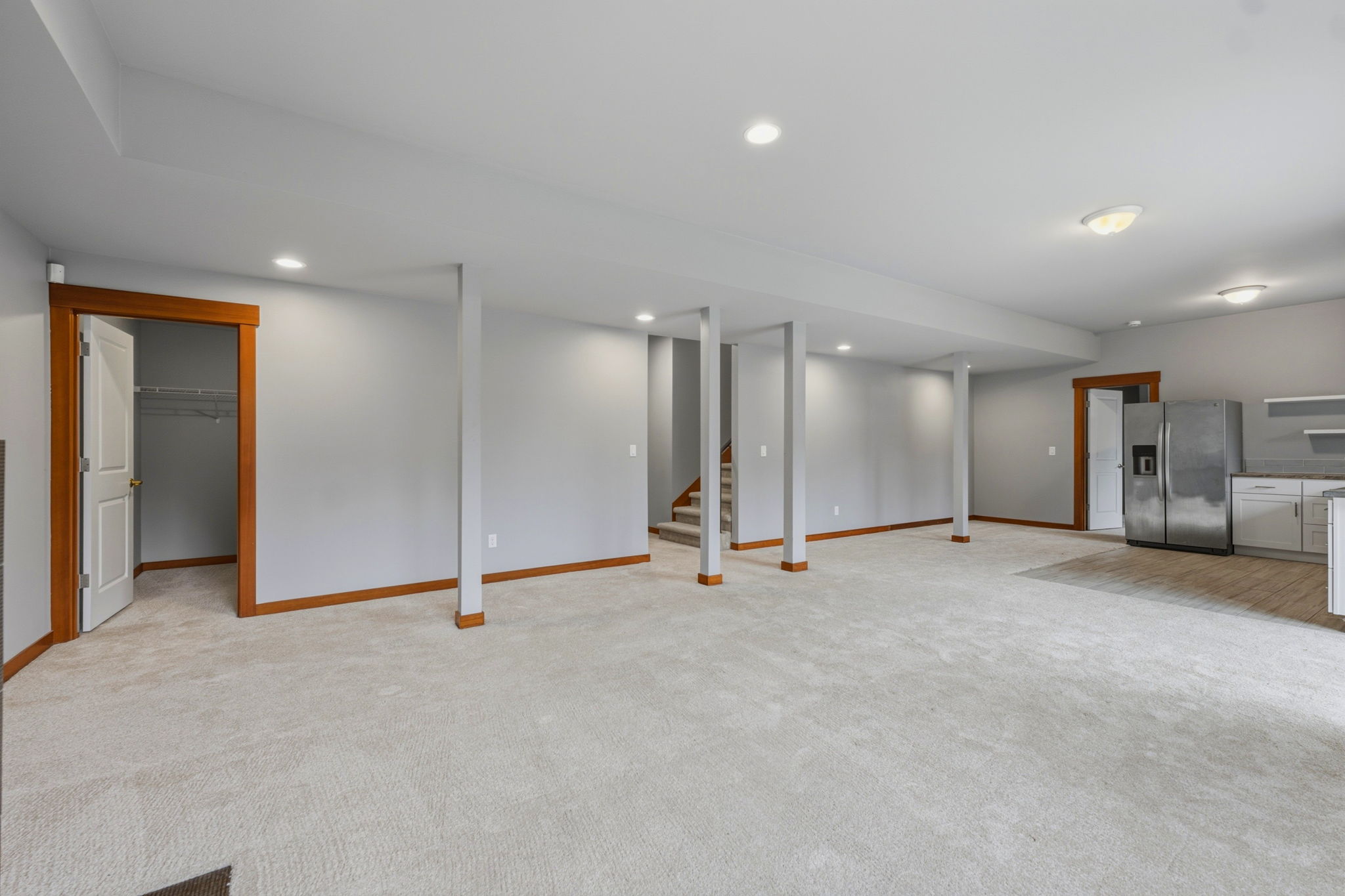 2nd Living room looking at large closet, stairs to the main level, 2nd kitchen