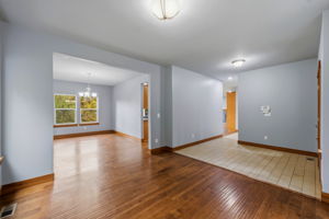 Living Room looking at dining to the left and entryway to the right