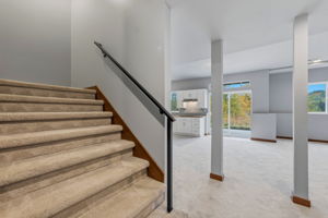 Stairs leading up to main level from downstairs