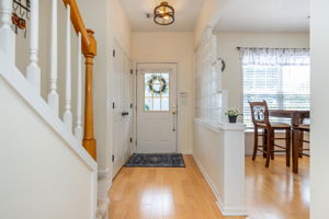 Foyer w upgraded Light Fixture.