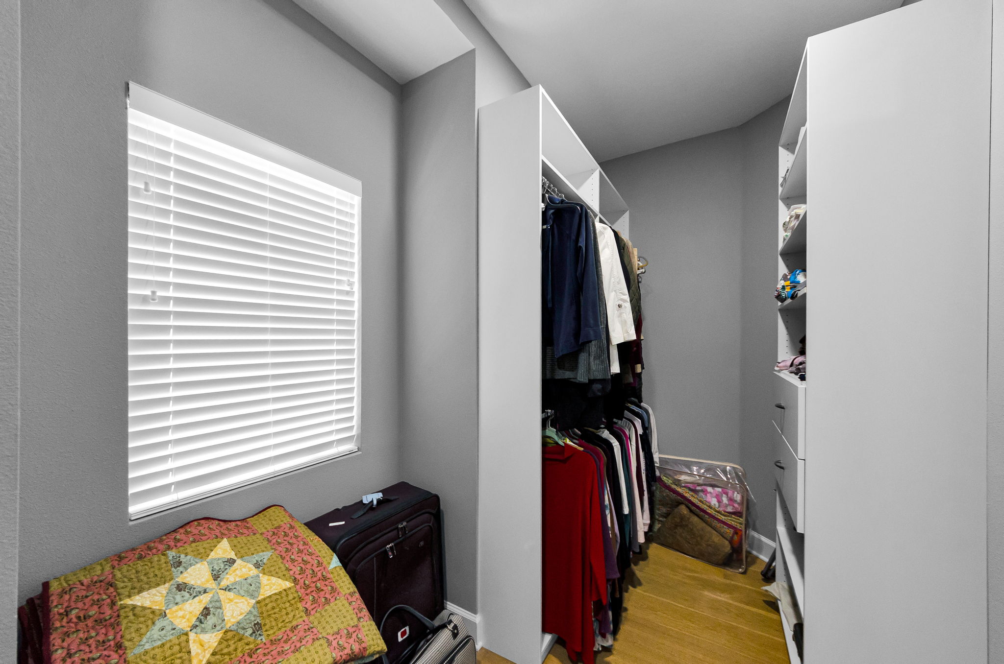 Upper Level Primary Bedroom Walk-in Closet1b