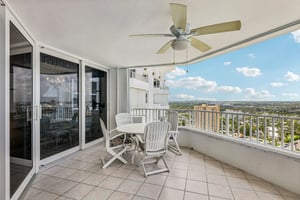 Large terrace with space for plenty of chairs and a dining table.