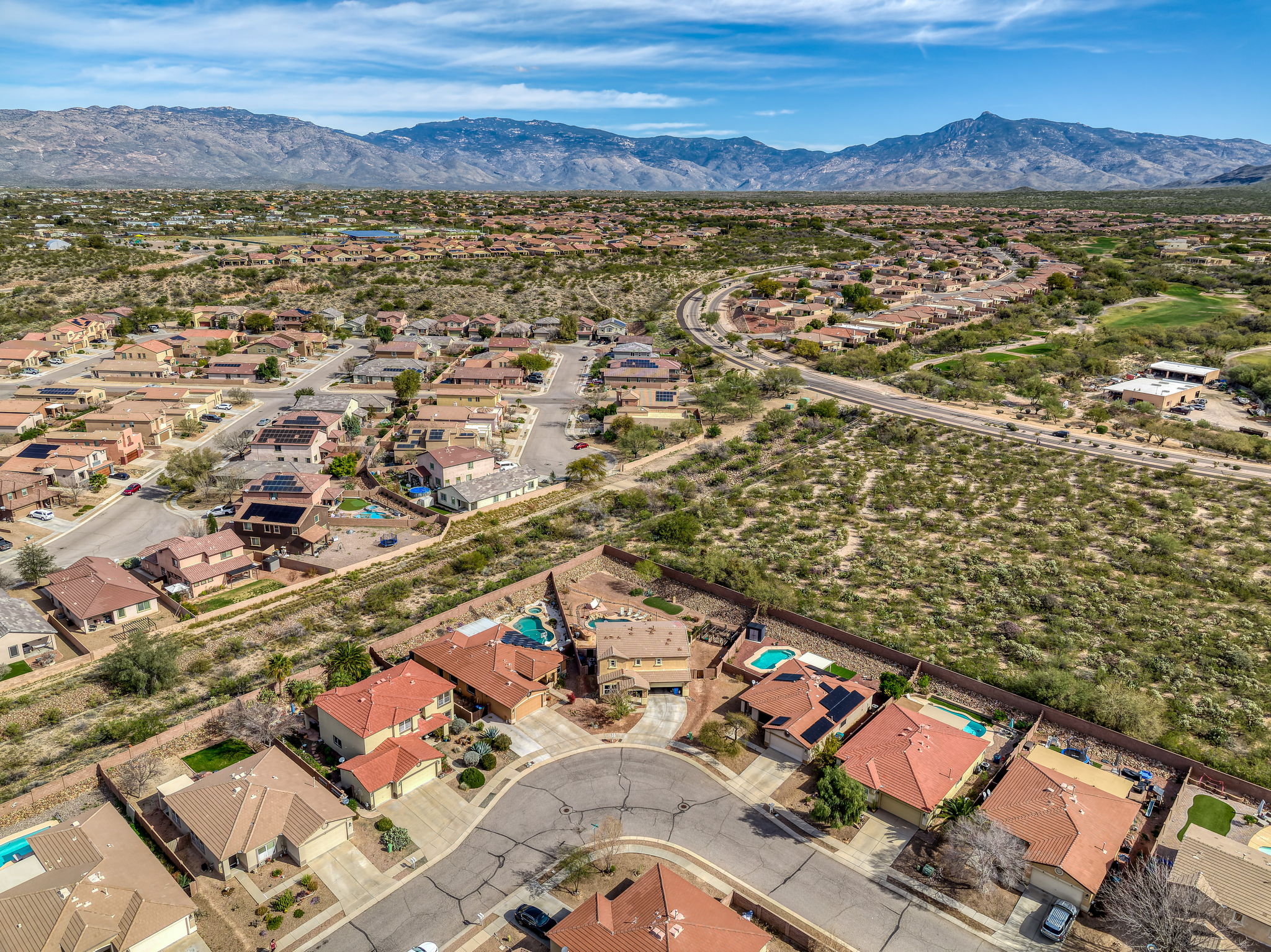 Aerial neighborhood and front of home