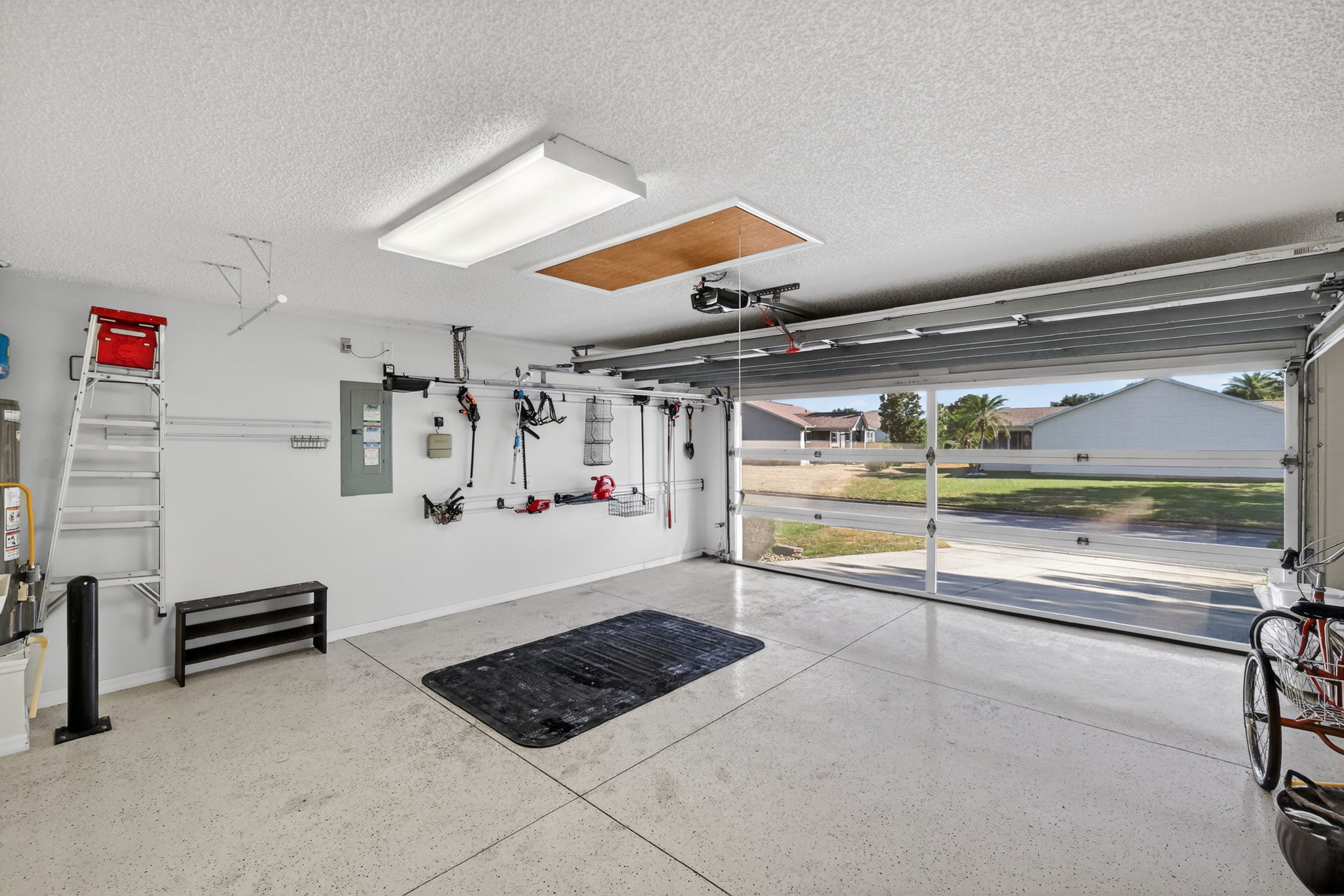 Garage with Motorized Screen