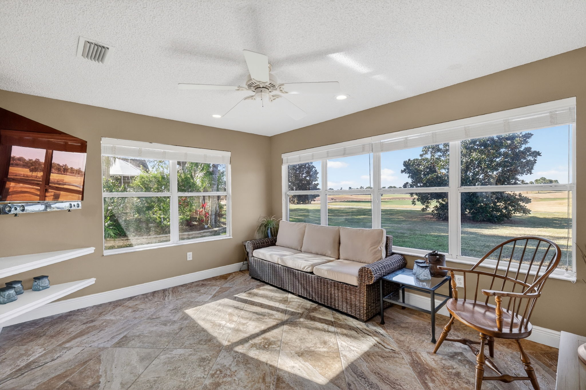 Florida Room overlooking Magnificent Water and Golf Front Views!